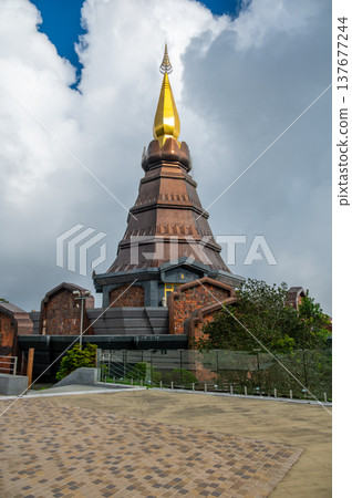 King Pagoda Naphamethinidon in Doi Inthanon National Park Thailand. Royal stupa built in 1987 to honor King Bhumibol Adulyadej, surrounded by mountain gardens and scenic views. 137677244