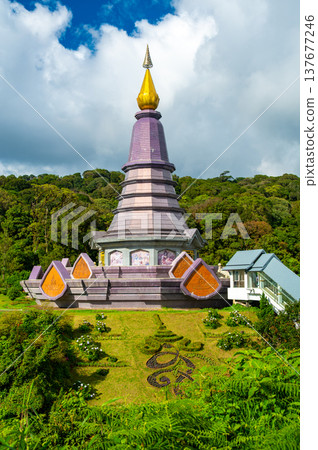 Queen Pagoda Naphaphonphumisiri at Doi Inthanon National Park Thailand. Royal stupa built in 1992 for Queen Sirikit, surrounded by gardens and mountain views near the highest peak of Thailand. 137677246