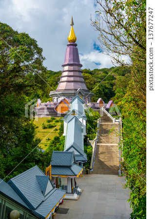 Queen Pagoda Naphaphonphumisiri at Doi Inthanon National Park Thailand. Royal stupa built in 1992 for Queen Sirikit, surrounded by gardens and mountain views near the highest peak of Thailand. 137677247