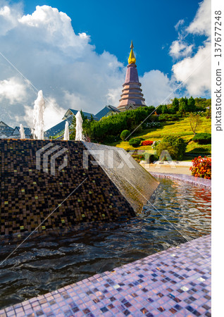 King Pagoda Naphamethinidon in Doi Inthanon National Park Thailand. Royal stupa built in 1987 to honor King Bhumibol Adulyadej, surrounded by mountain gardens and scenic views. 137677248