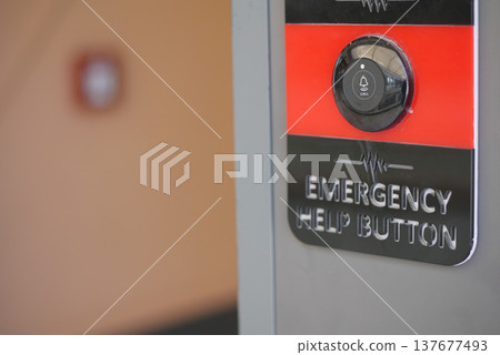 Emergency help button located in a public area Emergency help button located in a public area 137677493