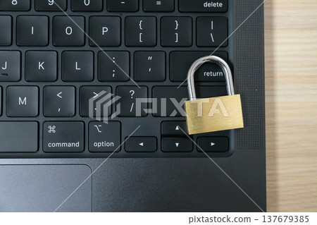 Laptop keyboard and padlock Laptop keyboard and padlock 137679385