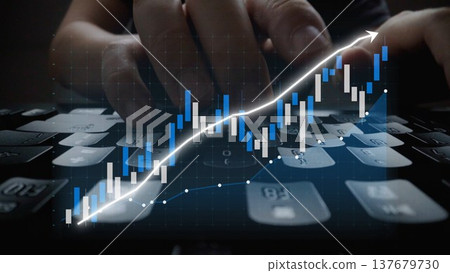 Hands Typing on Keyboard with Data Chart Overlay Representing Financial Growth, Investment, and Trading in Digital Management Systems Copula 137679730