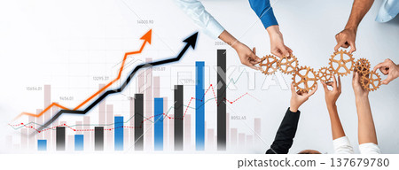 Business Growth Concept with Hands Holding Gears and Graphs Illustrating Progress and Strategy Through Teamwork and Innovation in Modern Workspace Scalp Business Growth Concept with Hands Holding Gears and Graphs Illustrating Progress and Strategy Through Teamwork and Innovation in Modern Workspace Scalp 137679780