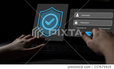 Hands Typing on Keyboard with Security Shield and Login Screen, Representing Online Security and Privacy Protection in Digital World Gantry Hands Typing on Keyboard with Security Shield and Login Screen, Representing Online Security and Privacy Protection in Digital World Gantry 137679826