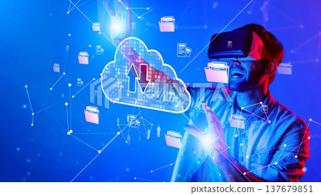 Excited young man wearing VR headset engaging in cloud computing while interacting with virtual data files in a vibrant digital environment. Raster Excited young man wearing VR headset engaging in cloud computing while interacting with virtual data files in a vibrant digital environment. Raster 137679851