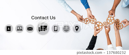 Collaboration Concept with Diverse Hands Connecting Gears, Symbolizing Communication, Business Networking, and Teamwork in Modern Workspace Gantry 137680232