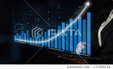 Business Professional Analyzing Graph Data on Laptop Screen with Rising Trend in Financial Performance Metrics for Corporate Success Copula Business Professional Analyzing Graph Data on Laptop Screen with Rising Trend in Financial Performance Metrics for Corporate Success Copula 137680244
