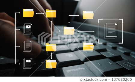 Digital organization and data management concept with folders and documents on a keyboard, symbolizing productivity and information flow in the workspace Gluon 137680260