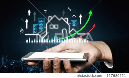 Hand Holding Smartphone Surrounded by Real Estate Growth Graphics with Charts and Arrows Illustrating Property Market Trends and Investments Impact Gluon Hand Holding Smartphone Surrounded by Real Estate Growth Graphics with Charts and Arrows Illustrating Property Market Trends and Investments Impact Gluon 137680351
