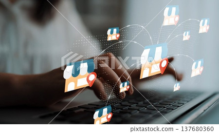 Digital Business Networking and Online Marketing Concepts with Store Icons on Laptop Keyboard for E-commerce Success and Growth Strategies Gluon 137680360