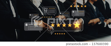 Group of diverse professionals engaging in feedback session showcasing digital review ratings and star reviews for effective team performance analysis Trope Group of diverse professionals engaging in feedback session showcasing digital review ratings and star reviews for effective team performance analysis Trope 137680390