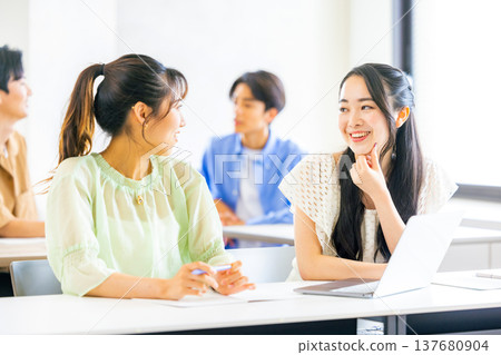 Two women studying Two women studying 137680904