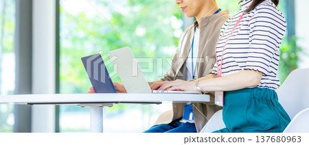 Business scene using a computer in the office Business scene using a computer in the office 137680963