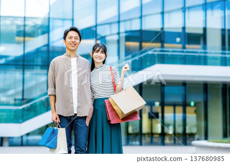 Shopping middle-aged men and women 137680985