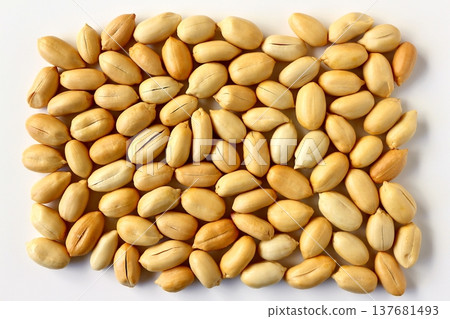 A large number of peanuts viewed from directly above against a white background. A large number of peanuts viewed from directly above against a white background. 137681493