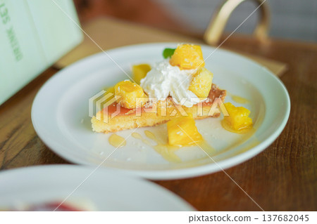 Cheesecake topped with pineapple Cheesecake topped with pineapple 137682045