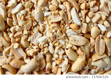 Crushed peanuts viewed from directly above Crushed peanuts viewed from directly above 137682520
