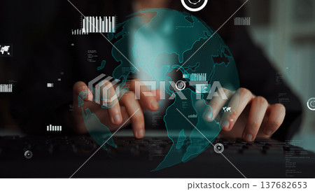 Hands typing on a keyboard with a digital globe overlay, showcasing global connectivity and technology in a modern workspace environment xenic Hands typing on a keyboard with a digital globe overlay, showcasing global connectivity and technology in a modern workspace environment xenic 137682653
