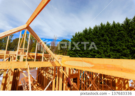 Construction beams frame structure on building framework worker Construction beams frame structure on building framework worker 137683336