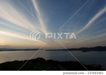 The Great Naruto Bridge as seen from Fukura, Minamiawaji City, Awaji Island (evening). 137683461
