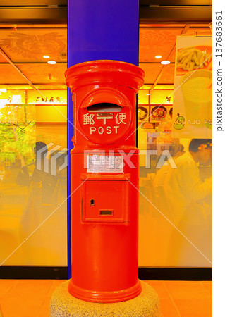 A nostalgic red round mailbox A nostalgic red round mailbox 137683661