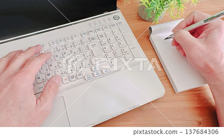 A businessman taking notes A businessman taking notes 137684306