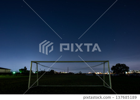 Night view with soccer goalposts 137685189