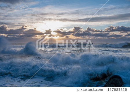 Sunrise over the turbulent torii gate at Kamiiso 137685856