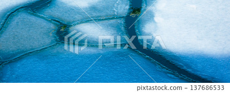 The frozen landscape of Yubetsu Fishing Port in the Okhotsk region of Hokkaido in the middle of winter. 137686533