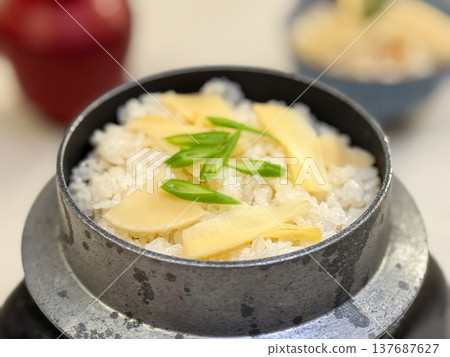 Bamboo shoot rice cooked in a pot and red miso soup: A Japanese spring rice dish set. Bamboo shoot rice cooked in a pot and red miso soup: A Japanese spring rice dish set. 137687627