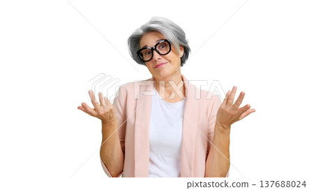 Older woman shrugging shoulders expressing doubt and uncertainty 137688024
