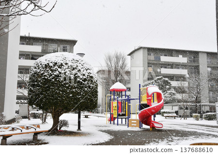 Playground equipment in a snowy housing complex_01 Playground equipment in a snowy housing complex_01 137688610