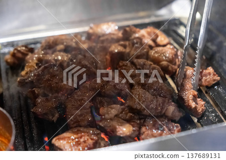 Sirloin Hanwoo Beef, marbled Korean Style Meat on the Grill. BBQ rare meat with soft focus Sirloin Hanwoo Beef, marbled Korean Style Meat on the Grill. BBQ rare meat with soft focus 137689131