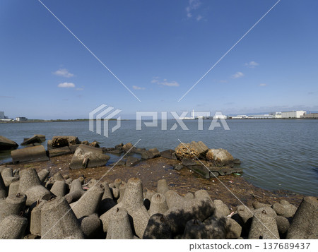 The destroyed breakwater at the mouth of the Yamato River 137689437