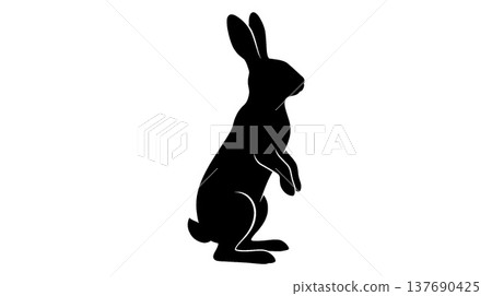 A black silhouette of a standing rabbit A black silhouette of a standing rabbit 137690425