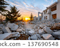 Damaged building rubble with sunset and hope for renewal 137690548