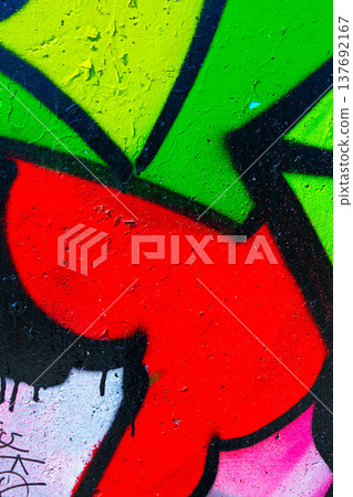 Graffiti Urban Concrete Wall with Red Green and Black Spray Paint 137692167