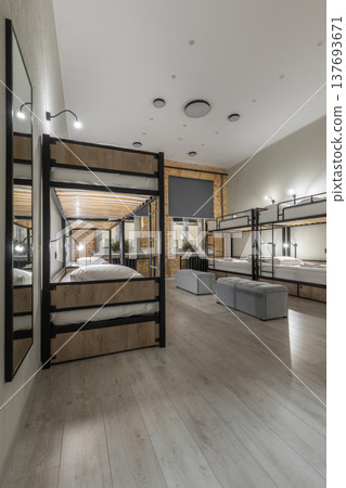 Contemporary Hostel Dormitory with Wooden Bunk Beds and Industrial Decor 137693671