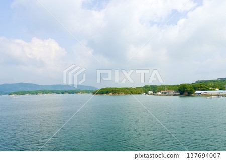 Ise-Shima: A view of the calm sea and islands from a cruise ship in Ago Bay, Shima City, Mie Prefecture. Ise-Shima: A view of the calm sea and islands from a cruise ship in Ago Bay, Shima City, Mie Prefecture. 137694007