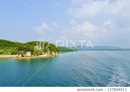 Ise-Shima: A view of the calm sea and islands from a cruise ship in Ago Bay, Shima City, Mie Prefecture. Ise-Shima: A view of the calm sea and islands from a cruise ship in Ago Bay, Shima City, Mie Prefecture. 137694011