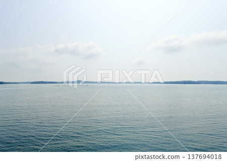 Ise-Shima: A view of the calm sea and islands from a cruise ship in Ago Bay, Shima City, Mie Prefecture. 137694018