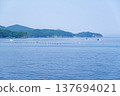 A view of pearl cultivation rafts floating on the calm waters of Ago Bay, Ise-Shima, Mie Prefecture. 137694021