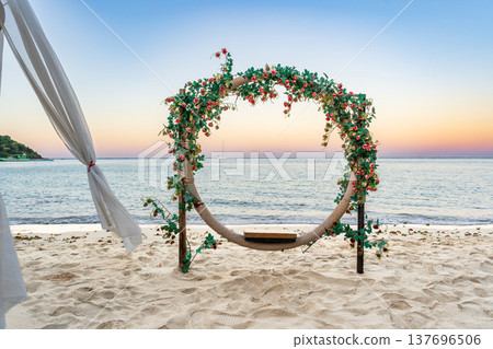 Romantic Beachfront Floral Installation at Sunset 137696506
