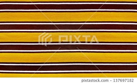 vibrant maroon and mustard striped knit fabric closeup evoking autumn warmth for cozy wallpaper or apparel background vibrant maroon and mustard striped knit fabric closeup evoking autumn warmth for cozy wallpaper or apparel background 137697182