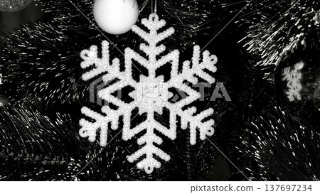 elegant monochrome sparkling snowflake christmas ornament closeup for holiday branding elegant monochrome sparkling snowflake christmas ornament closeup for holiday branding 137697234