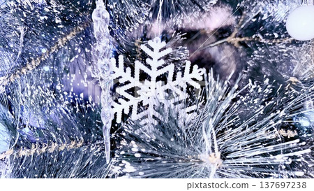 sparkling silver snowflake and crystal icicle on frosty christmas tree branch for holiday branding sparkling silver snowflake and crystal icicle on frosty christmas tree branch for holiday branding 137697238