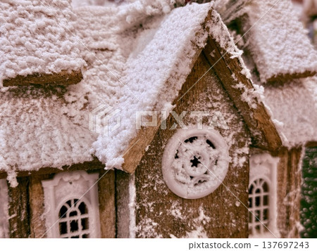 whimsical snowy gingerbread house gable close-up for holiday branding and print media whimsical snowy gingerbread house gable close-up for holiday branding and print media 137697243