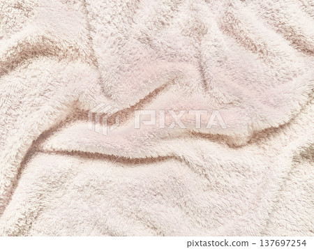 soft pastel pink fluffy towel texture closeup for web background or spa branding 137697254