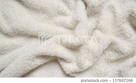 close-up of plush white fluffy fabric texture for spa branding or web design background 137697266